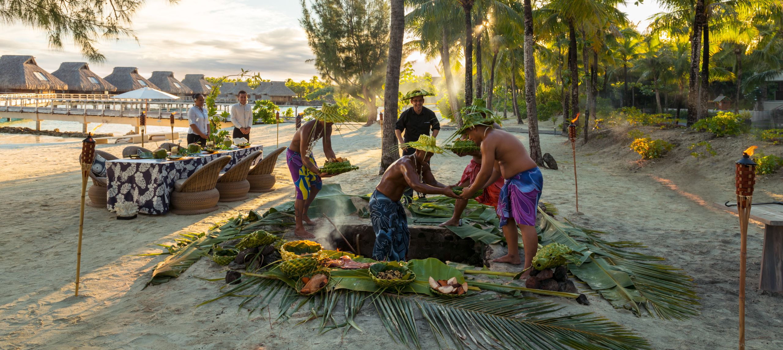 Men Preparing Polynesian Barbecue