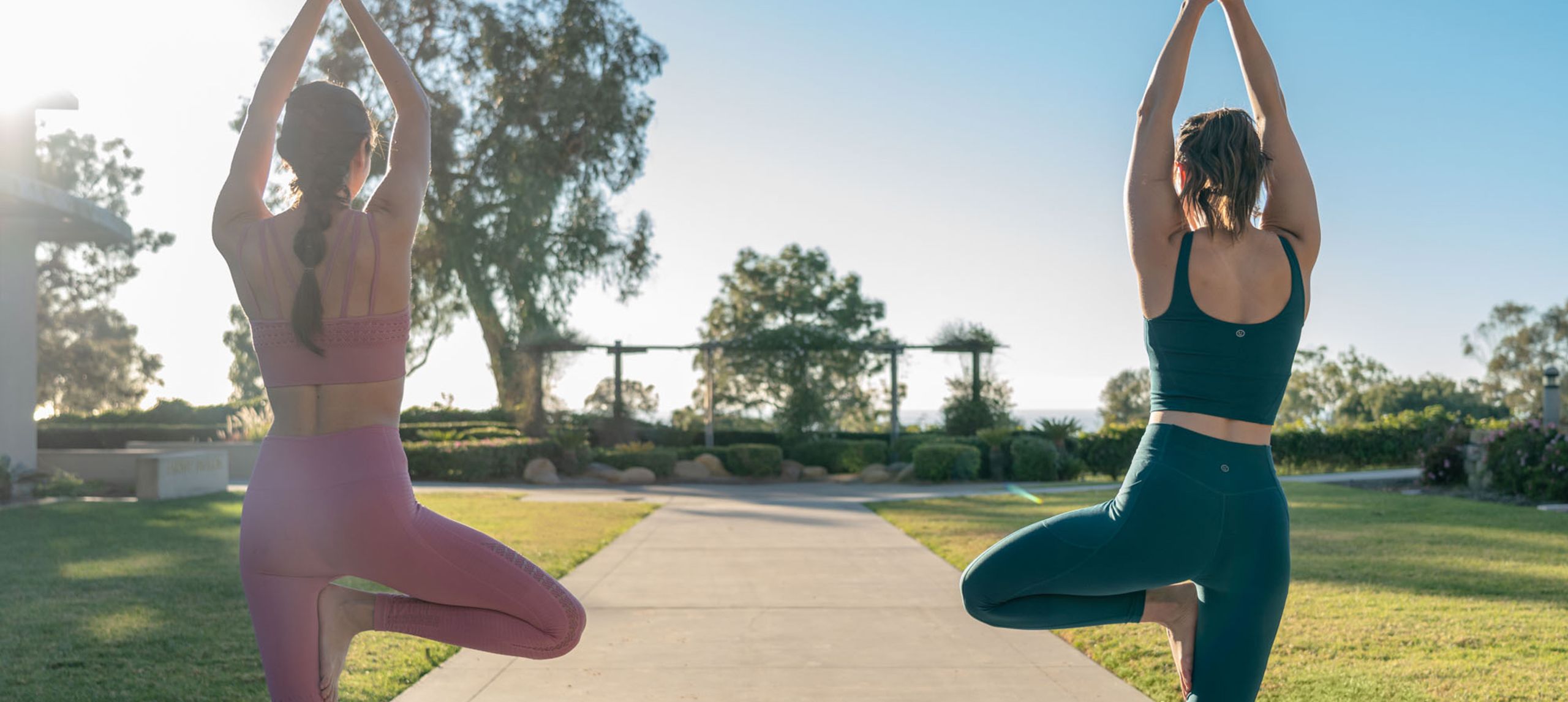 women doing yoga outdoors