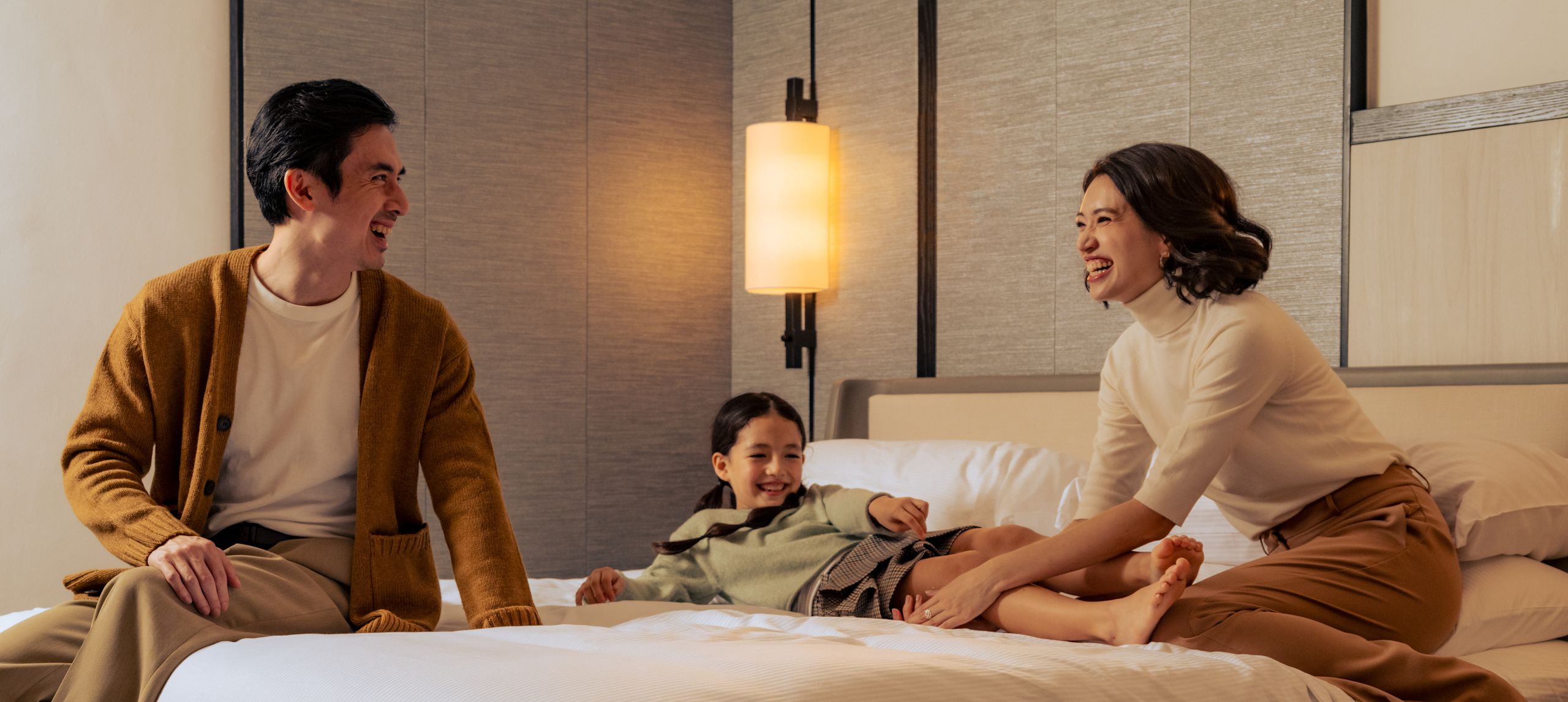 Happy Family in Guest Room