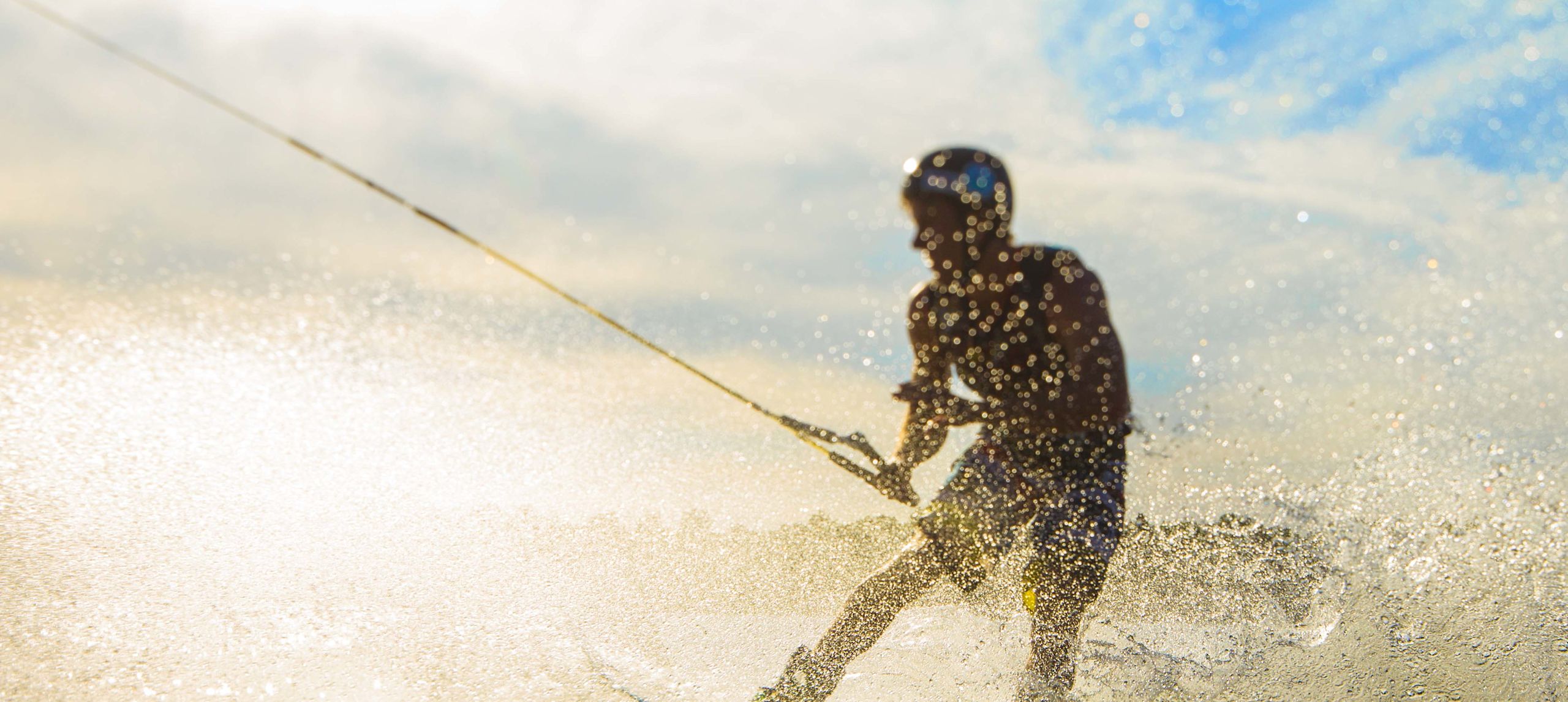 Person waterskiing in the ocean-transition