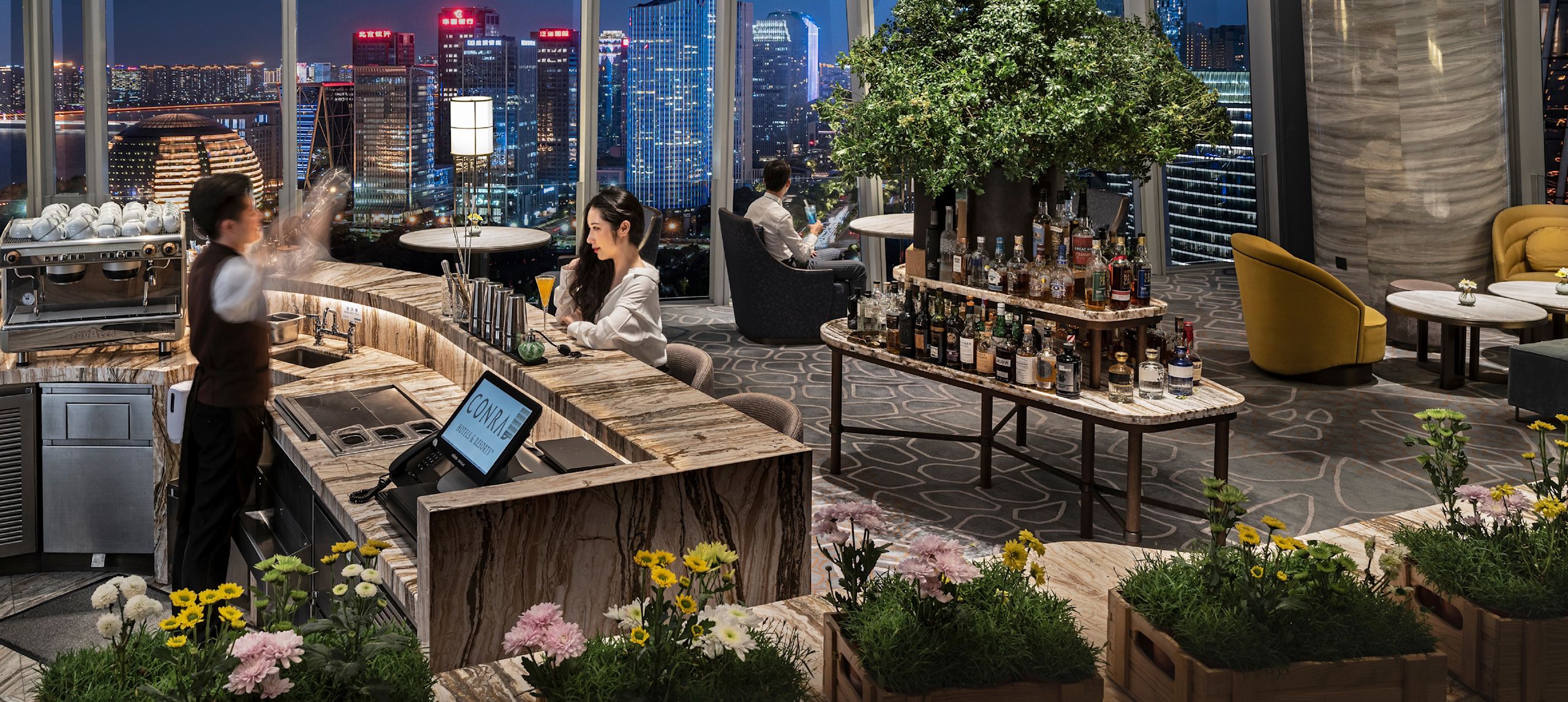 Bar area with seating and view of city