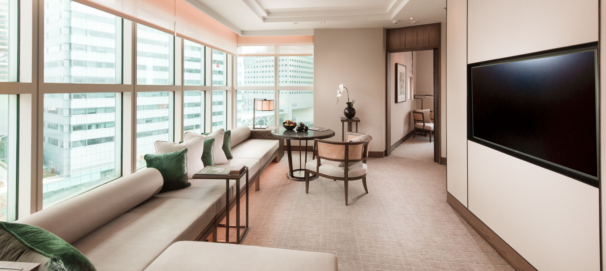 Centennial Suite Living Room wiith Large Windows and Seating Area