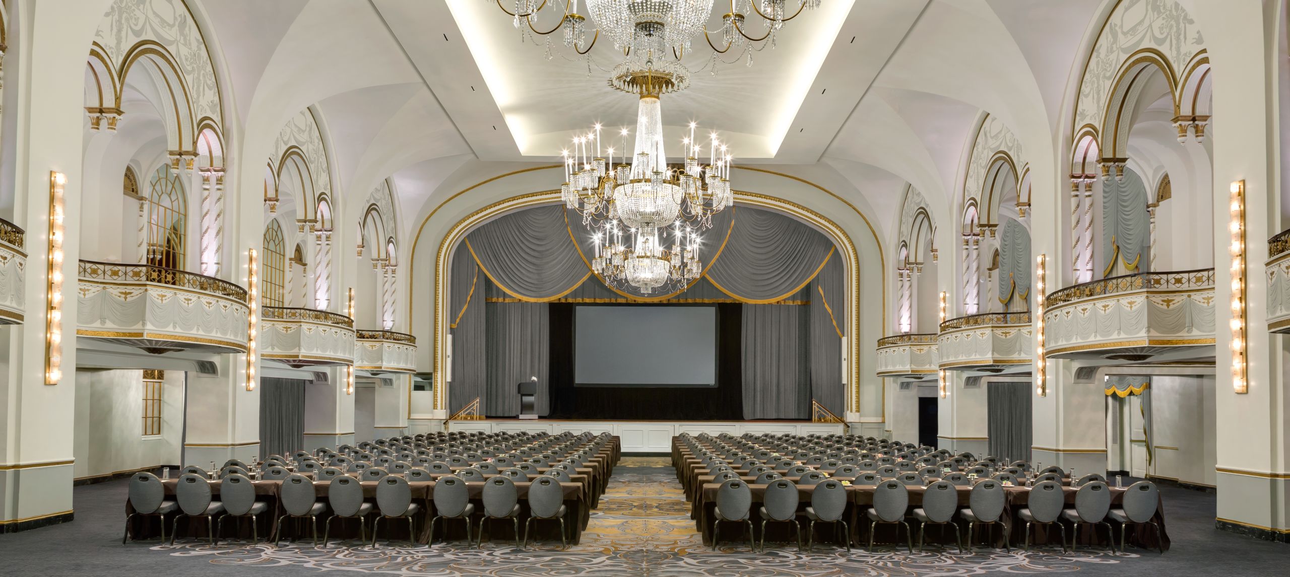 Grand Ballroom with chandeliers and chairs