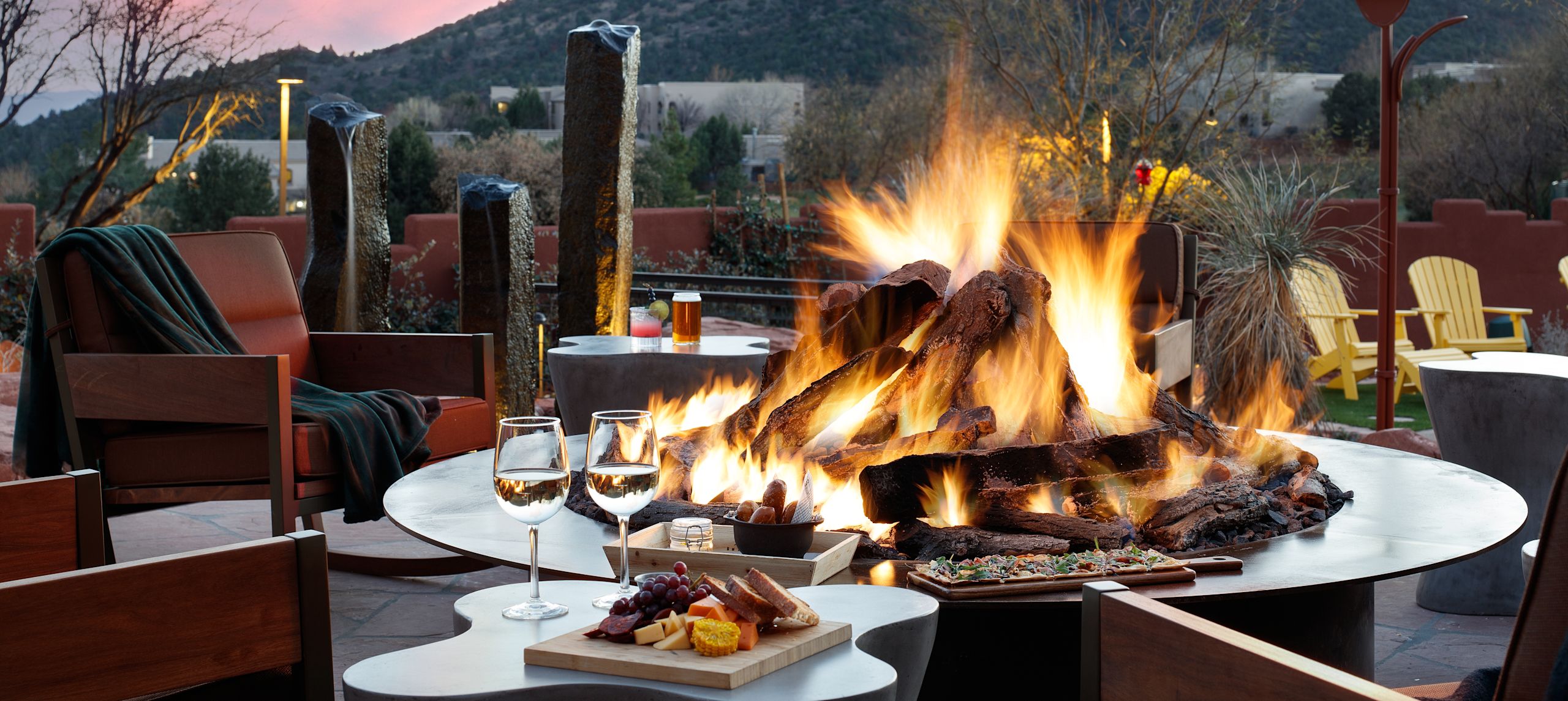 Dining Outdoors by a Firepit at ShadowRock Tap and Table with Mountain View in the Background