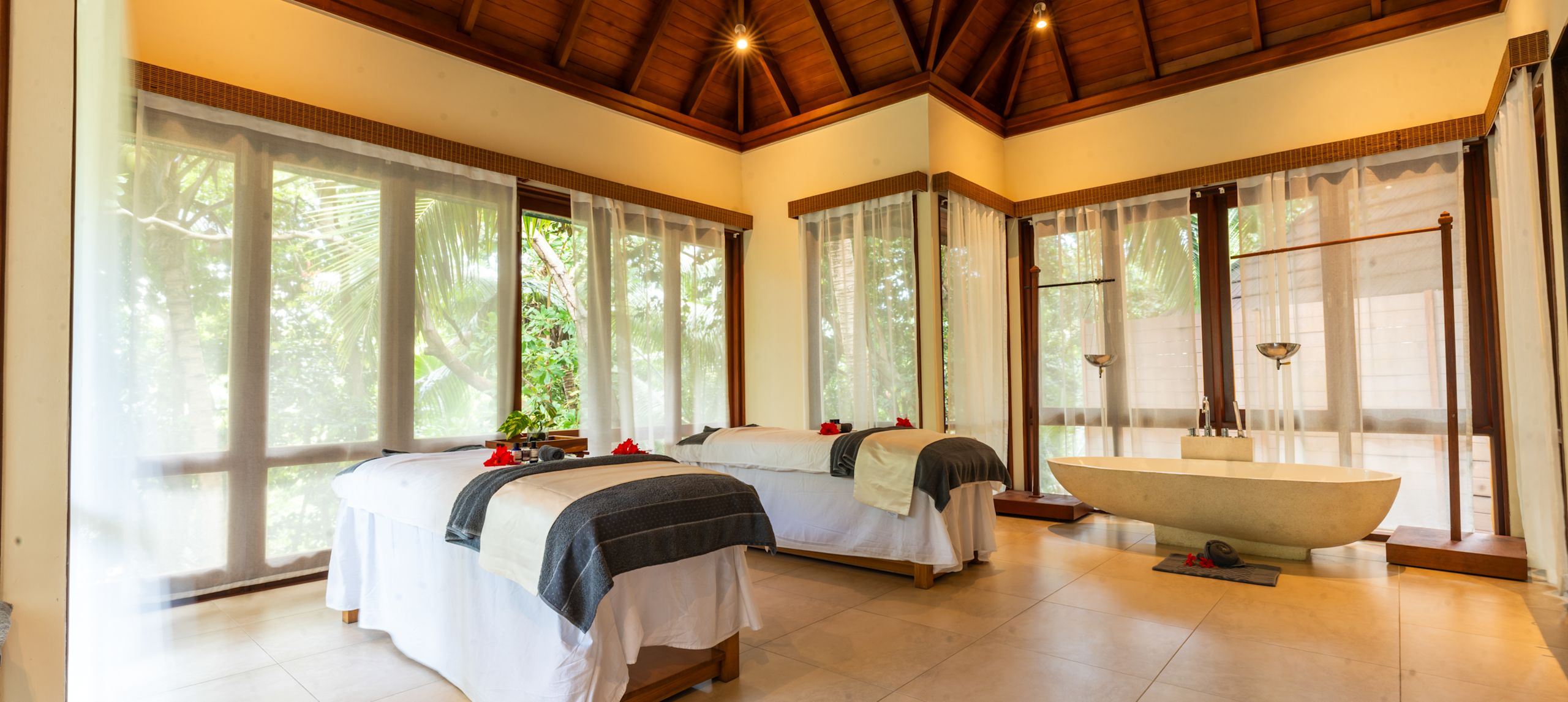Dual Massage Tables at the Spa and a Bathtub