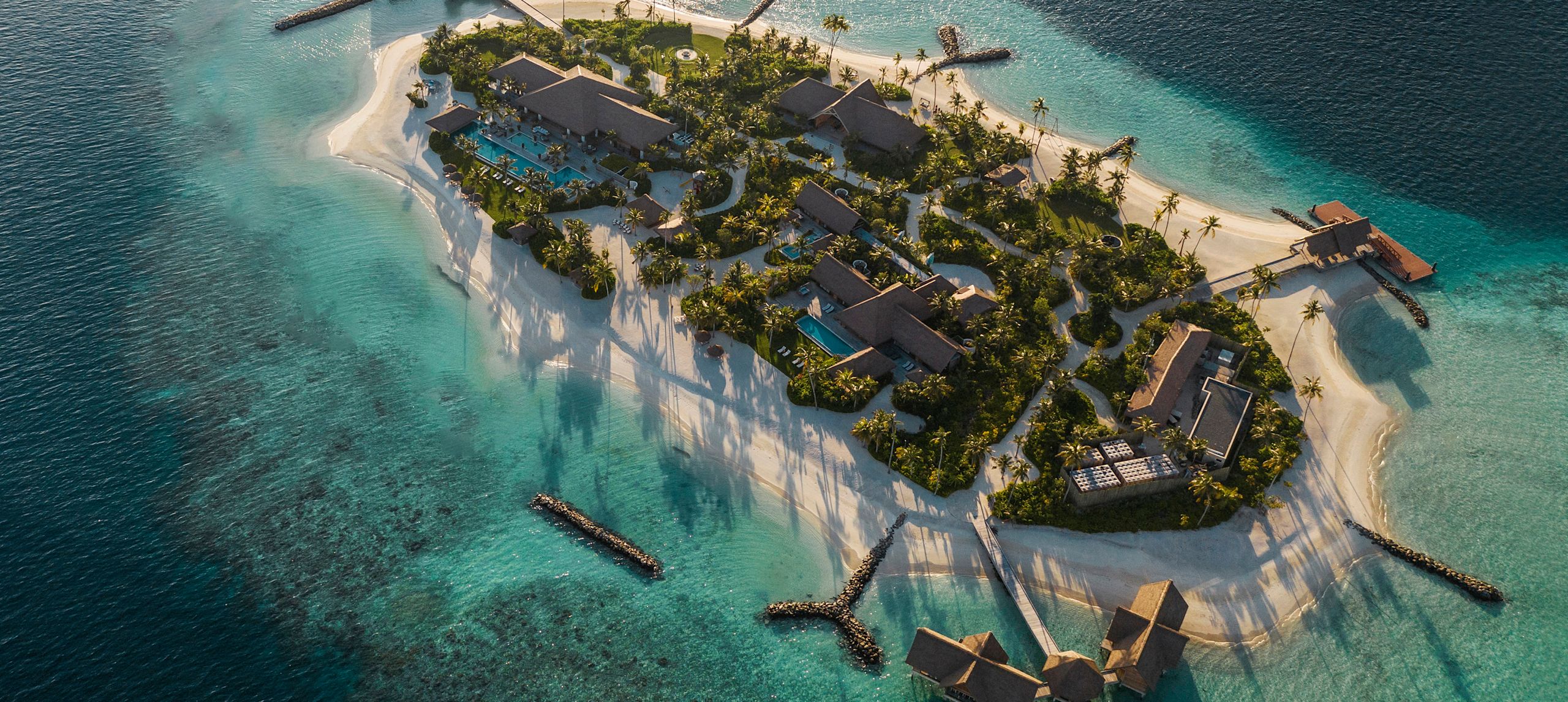 Private island with trees and buildings-transition