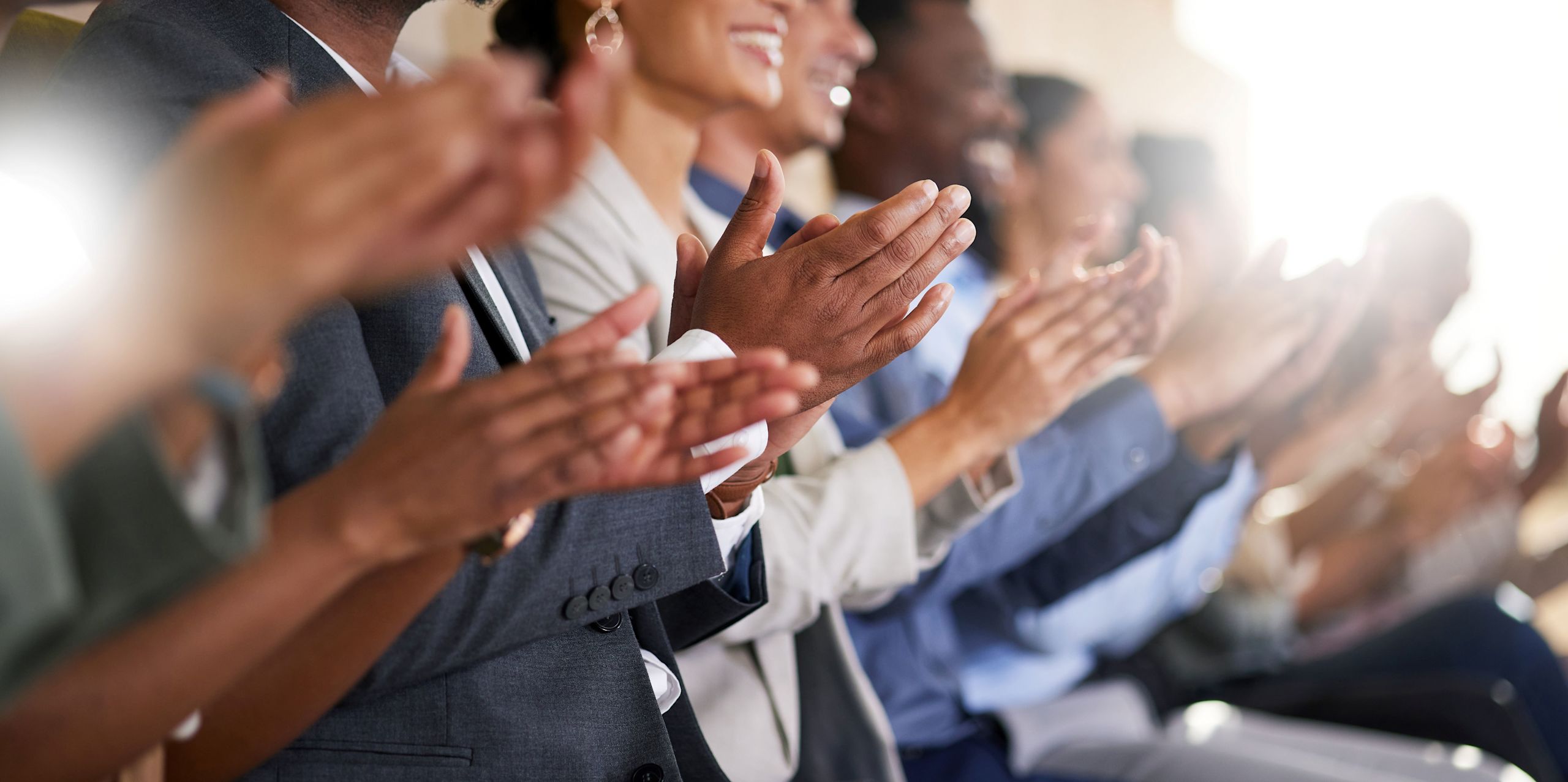 Stock image of people clapping
