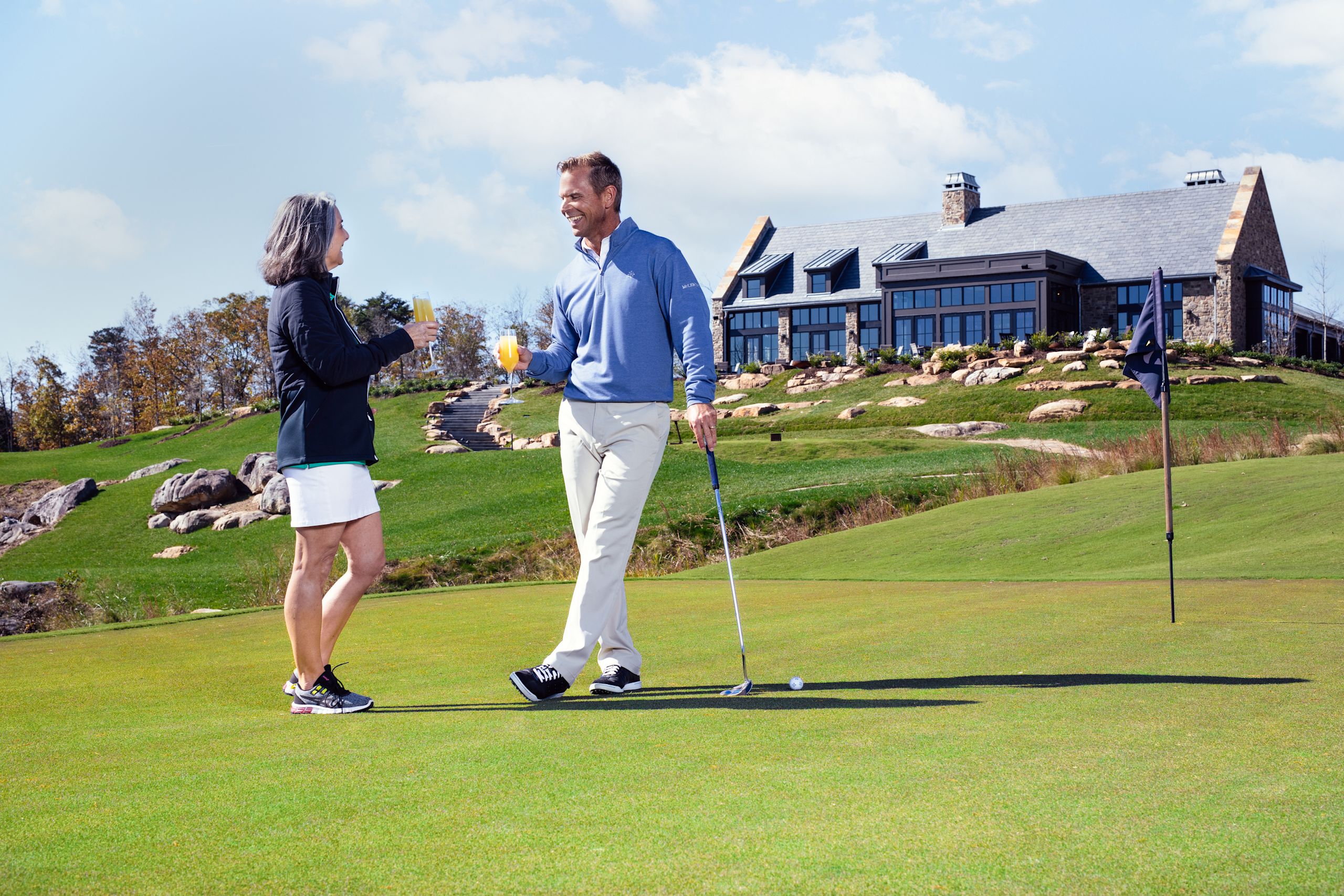 Two golfers playing on short course