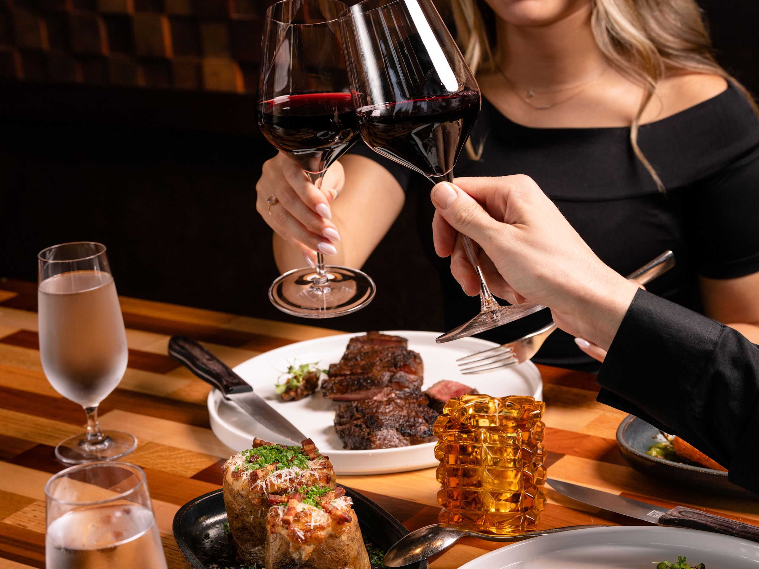 Couple Dining and Having Wine at a Restaurant