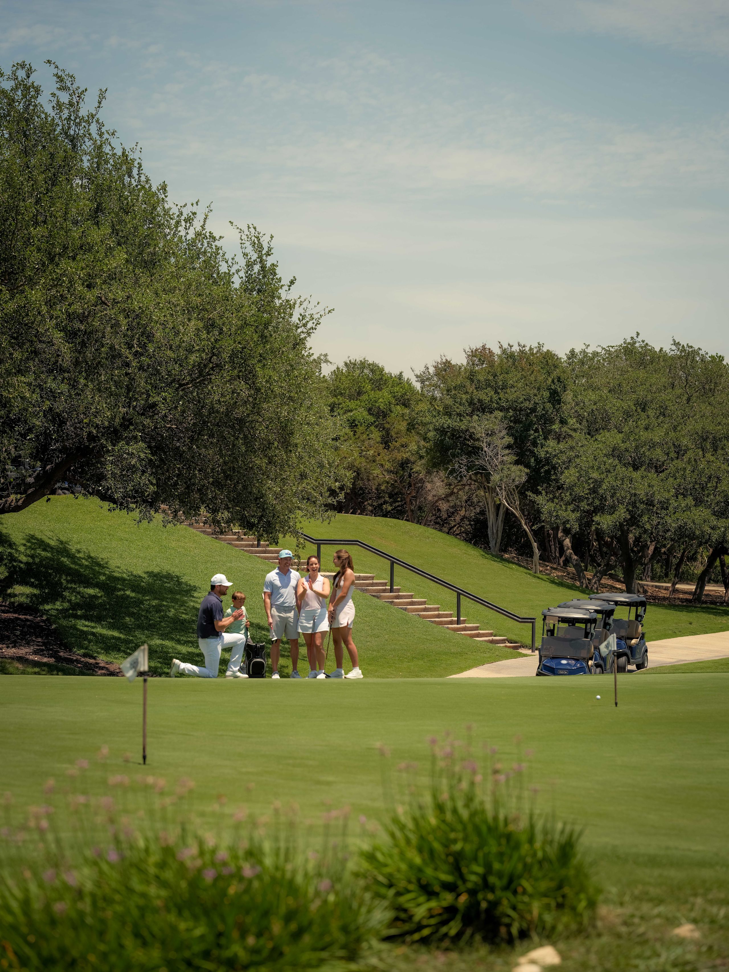 Golfers standing on the course