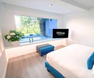 Large Bed in a Suite with Pool Area