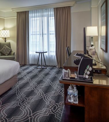 Bedroom with lamps and a chair