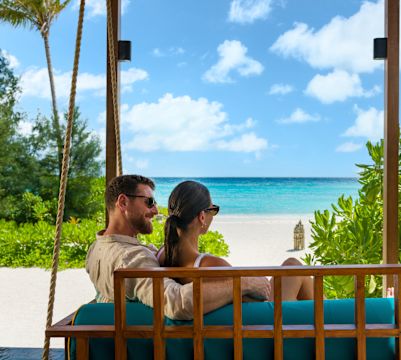 couple on outdoor lounge area