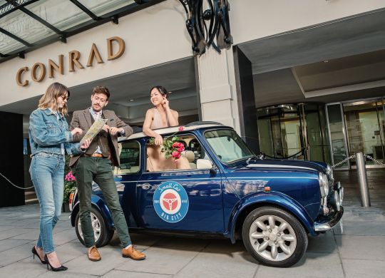 People Outside a Conrad Hotel