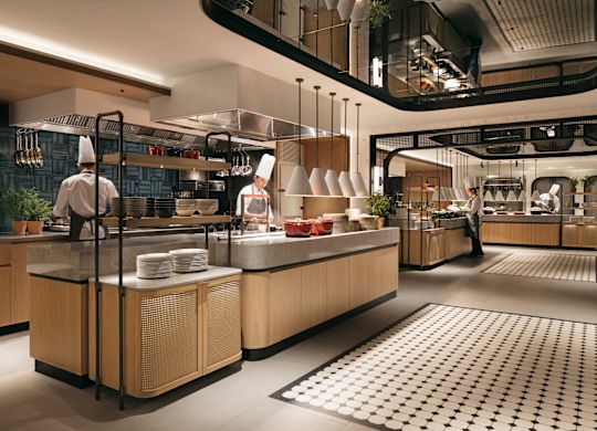 Residential style kitchens with staff