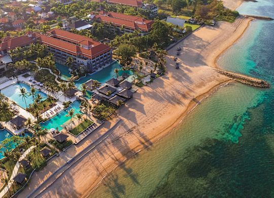 Hotel exterioe with pools and beach