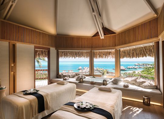Spa Room with Two Massage Tables and Hot Tub