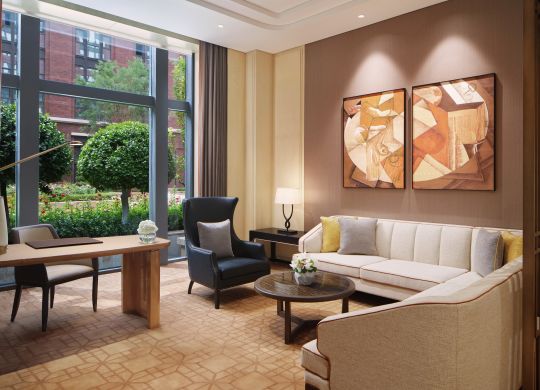 Living area in suite with comfortable seating