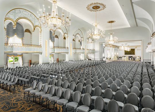 Grand Ballroom with chandeliers and chairs