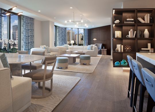 Loungeområde med bekväma sittplatser och bokhylla