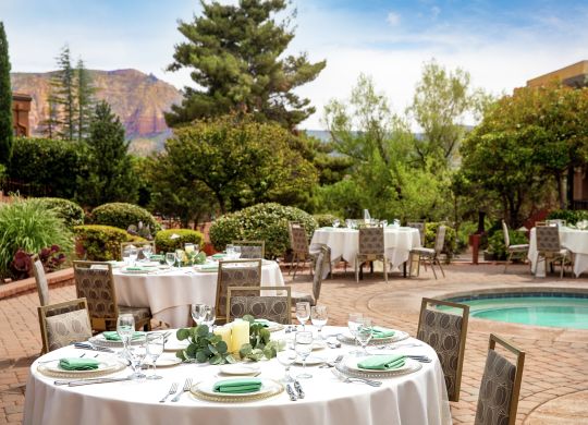 Tables Setup for Event in Outdoor Swimming Pool Area