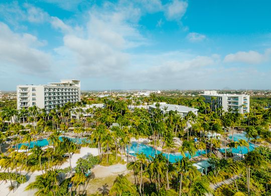 arial view of the resort pools and hotel exterior