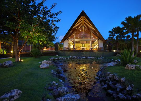 Villa shot from far back at dusk