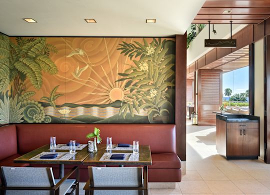 Waiolu Ocean Cuisine establishment with table and chairs