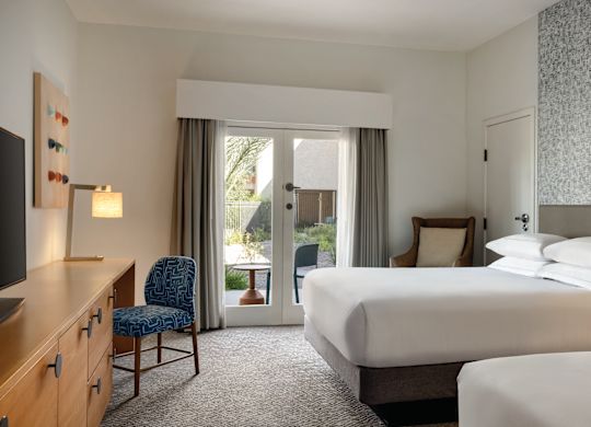 Rooms & Suites Two twin beds in room.