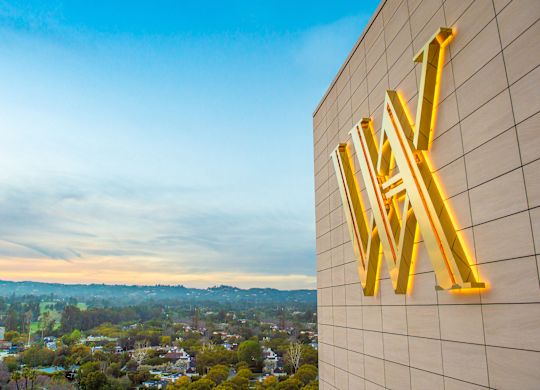 Aerial View of Waldorf Astoria Logo on Hotel Exterior 