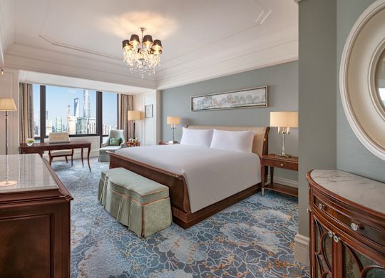 Deluxe King Guest Room with a Work Desk and City View