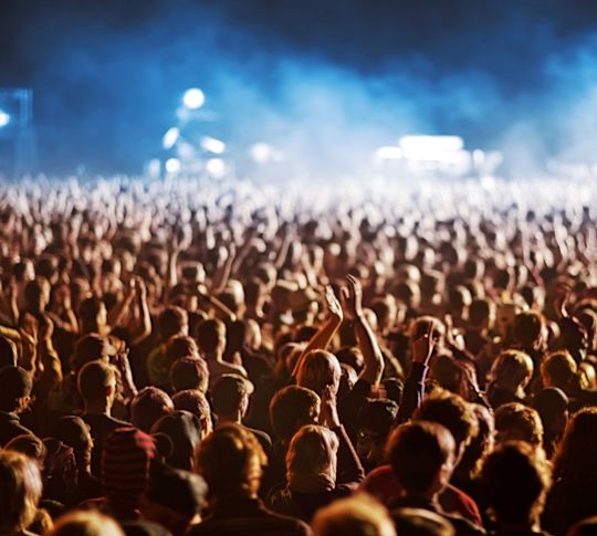 Crowd of Concertgoers at Night