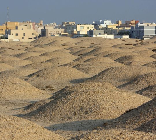 Burial Mounds and View of City in Background