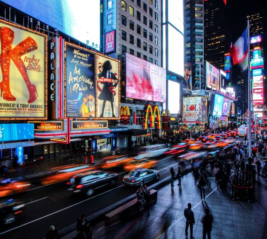 Broadway Street with People and Lights