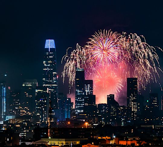 Fireworks Display in a City at Night