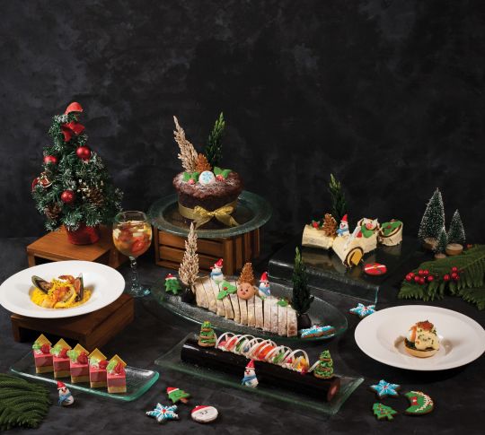 Christmas decorated display of a variety of food options.