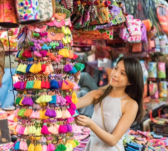 A Woman Shopping for Treasures at Chatachak Market