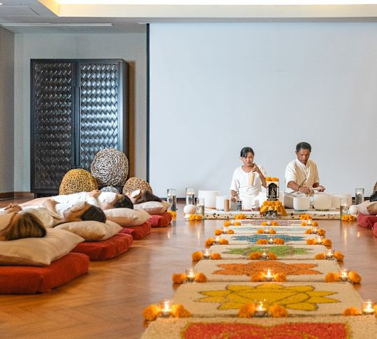 A group of people in a relaxing room at the spa
