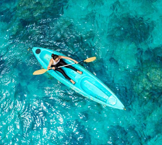 Top down view of person kayaking