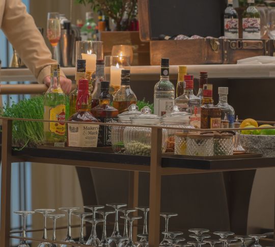 Bar cart full of drinks and mixers