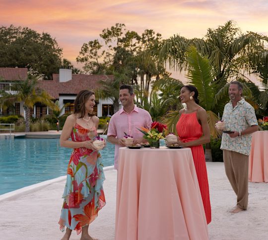 Guests at the Outdoor Daylily Beach Meeting Space by the Pool-transition