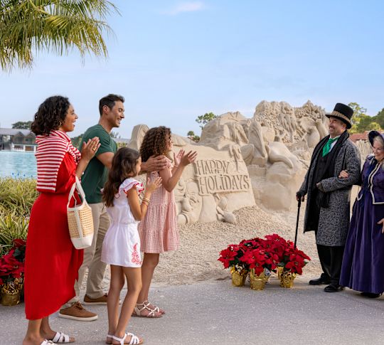 Family Listening to Holiday Carolers Dressed in Pilgrim Attire