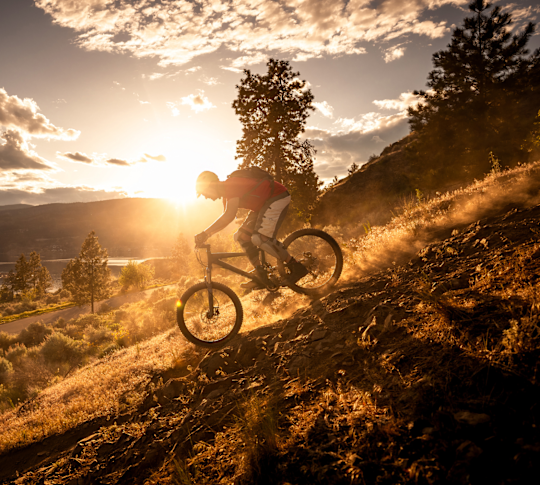 man riding a mountain bike