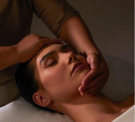 guest receiving a facial at the spa