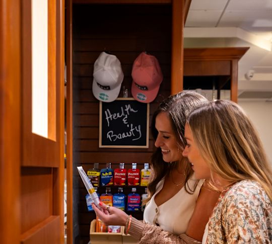 guests shopping at The Market, snacks and gift shop