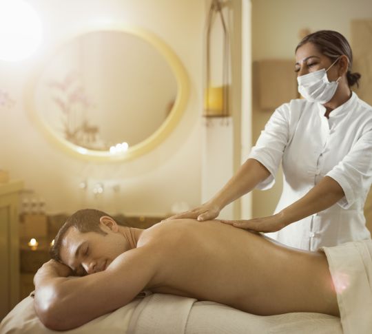 Man being massaged in Spa