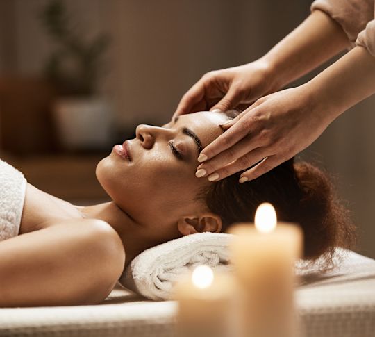 Woman receiving spa massage