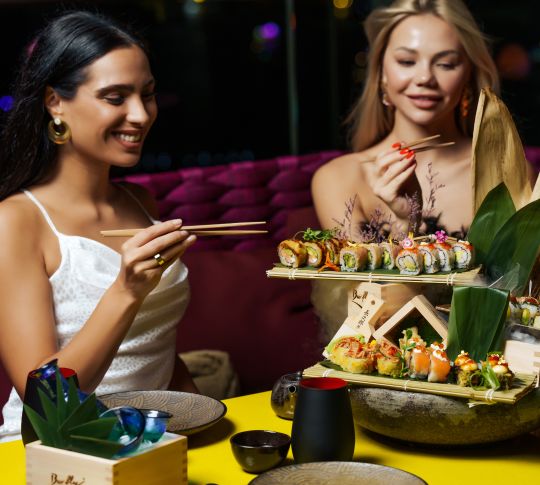 Ladies Enjoying Sushi at Barfly by Buddha Bar Dubai