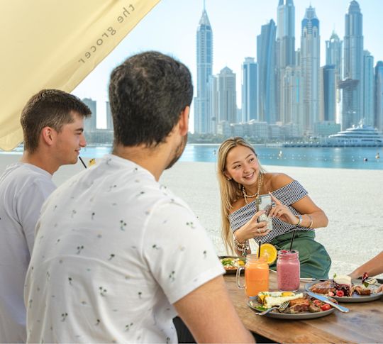 People Dining Outside At Jones The Grocer