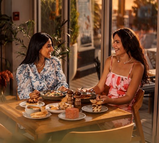 Two Women Dining at Jones the Grocer Restaurant